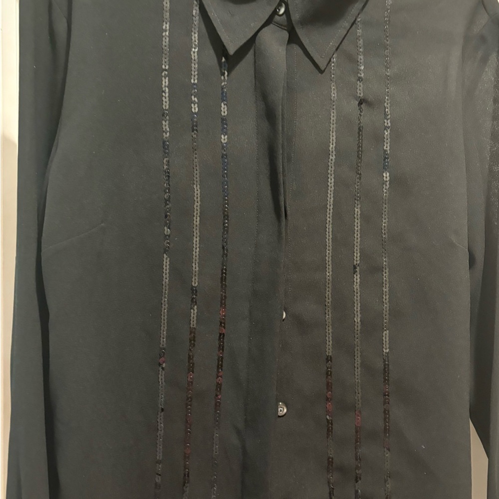 Hundred percent polyester,black blouse